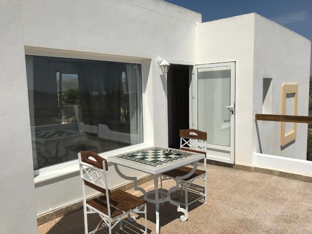 Private terrace with table and chairs